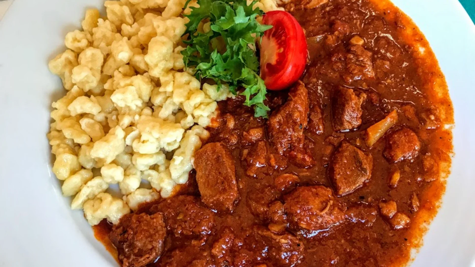 Authentic Hungarian Beef Goulash (Marhapörkölt) with Nokedli (Hungarian Dumplings) cafe-kor-budapest-31